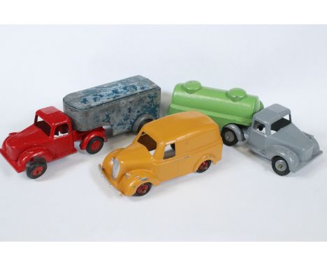 Three Timpo Toys Vehicles diecast models to include Articulated Petrol Tanker in grey and green, Articulated Truck in blue an