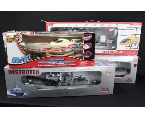Four boxed R/C models to include 2 x 1/275 Aircraft Carrier Radio Control Model Series HT-R/C, New Bright Fountain Boat and W
