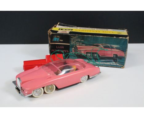 Boxed JR 21 Rosenthal Toy Lady Penelope's FAB 1 battery operated remote control plastic model, complete with both figures, in