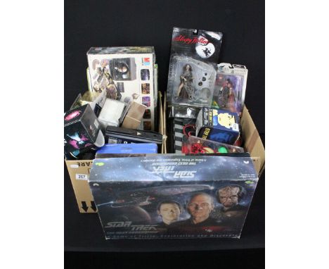 Collection of mainly Star Wars and Star Trek collectibles featuring carded Star Wars Collector Timepiece, sealed Star Trek Th