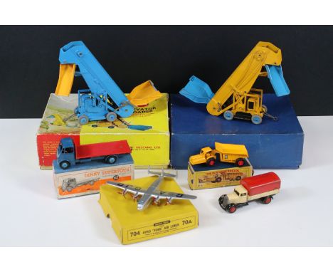 Four boxed Dinky diecast models to include 2 x Supertoys 964 Elevator Loader (1 x in main body blue), Supertoys 512 Guy Flat 