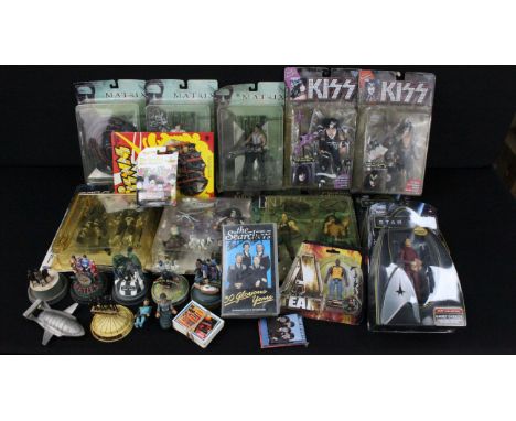 Collection of TV related figures featuring 5 x carded McFarlane Toys Kiss figures, 3 x carded N2 Toys The Matrix figure (Tank
