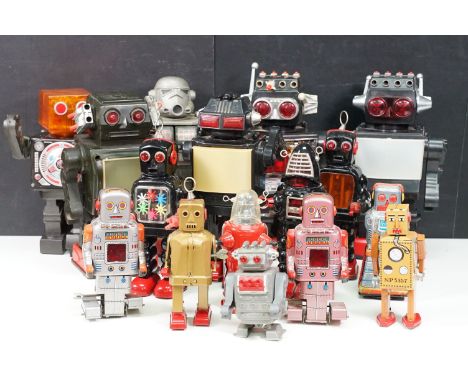 Collection of 16 tin plate and plastic battery operated and clockwork robots to include Super Astronaut, Saturn TV Robot, Hig