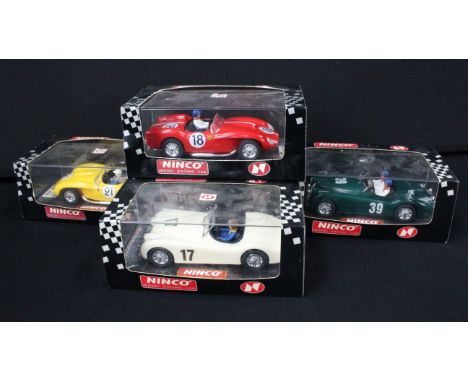 Four boxed / cased Ninco slot cars to include 50160 Jaguar XK-120, 50150 Ferrari 250 TR Testa Rossa Rojo, 50159 Jaguar XK-120
