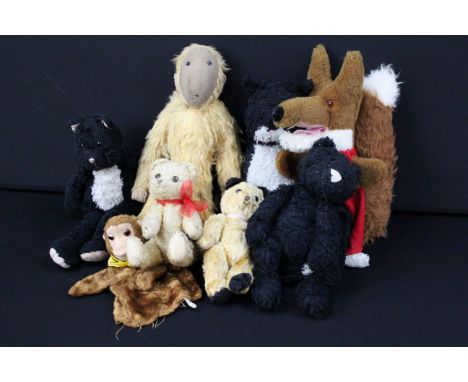 Eight mid 20th C onwards soft toys to include Wendy Boston Basil Brush hand puppet, 3 x Jellycat black cats, Chiltern monkey 