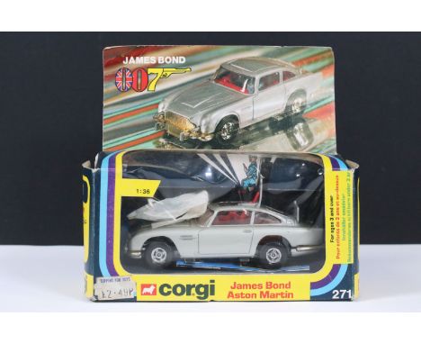 Boxed Corgi 271 1/36 James Bond 007 Aston Martin diecast model with 2 x ejector figures withing original bag, diecast showing