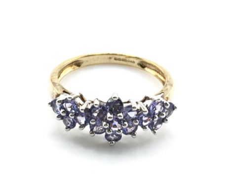 A 9 carat gold tanzanite set ring, size N, 2.1g. Postage category a