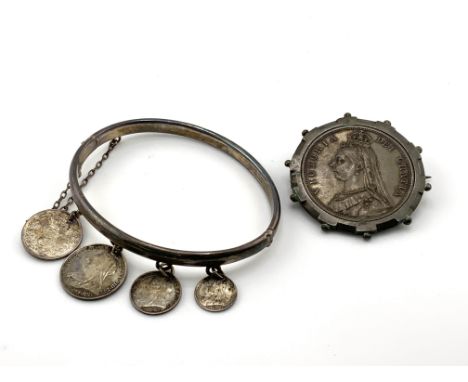 1887 Queen Victoria Half Crown with brooch mount together with a silver bangle mounted 4 Victorian silver coins.