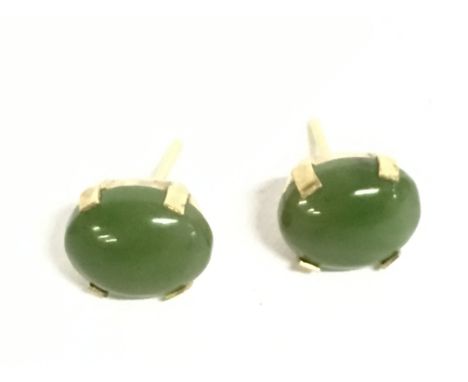 9 carat gold Jade earrings, total weight 1.9g. Postage category a