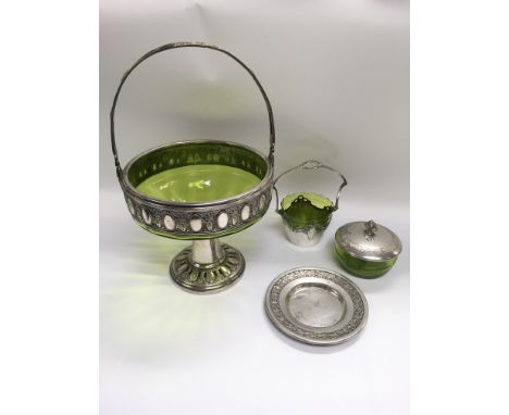 A WMF fruit basket with a green glass liner together with a smaller example, tidy jar and dish (4). Shipping category D
