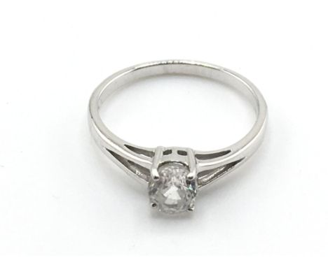 A 9ct white gold ring set with white stone. Size N and 2.2g