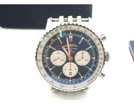 A boxed Breitling Navitimer chronograph wrist watch with papers. Exhibition case back. 46mm with blue dial. Seen running. Ext