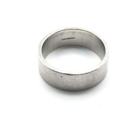 A Platinum ring. 16.6 and size X. Postage A