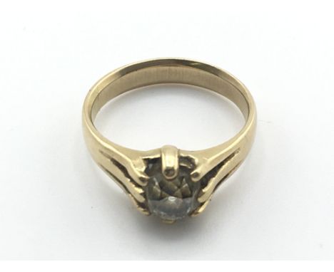 An high karat unmarked gold gents ring set with old cut diamond. Size P and 5.4g