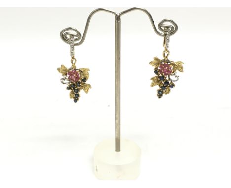 Silver gilt ruby and sapphire set drop earrings. Postage category a