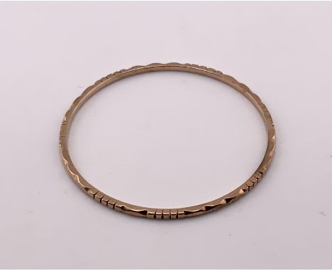 A gold bangle, minimum 9ct. 10.84g (A)