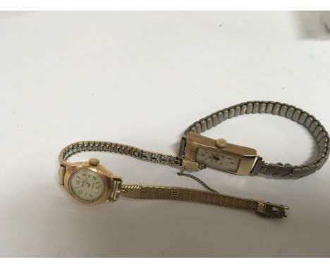 A ladies 18carat gold watch with plated strap and a 9carat gold Art Deco design ladies watch of rectangular shape not seen wo