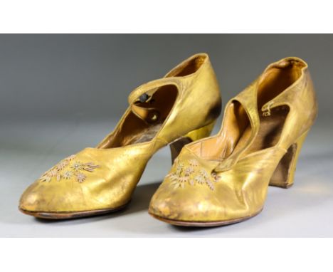 A Pair of 1920's Ladies Gilt Finished Leather Shoes, with embroidered floral decoration to front by Parker Shoes of Australia