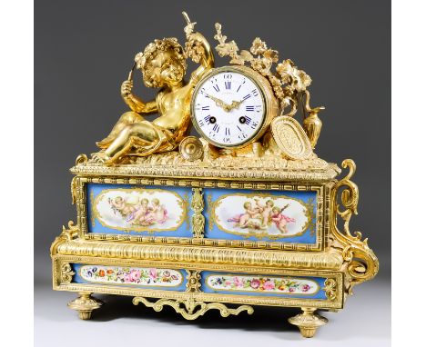 A Mid 19th Century French Gilt Brass and Porcelain Mounted Mantel Clock, by Henry Marc of Paris, No. 20495, the 3.25ins diame