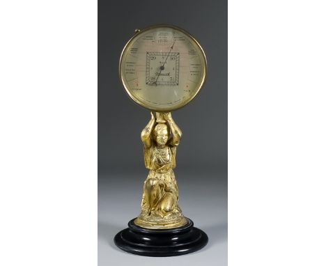 A 1930's Brass Cased Aneroid Barometer by Short &amp; Mason of London, with 4.75ins diameter silvered dial, contained in lacq