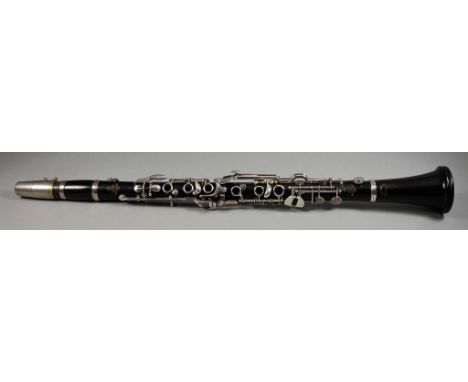 An Oehler System B Flat Clarinet, 20th Century, by F. Arthur Ubel, black wood with plated keys, No. 621 74981, 26ins overall,