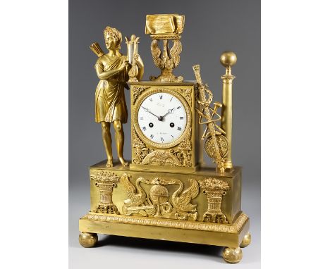 An Early 19th Century French Ormolu Cased Mantel Clock of "Empire" Design, the 3.25ins diameter white enamel dial signed by F