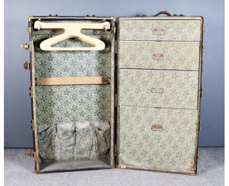 A 1920's American Black Fibre and Metal Mounted "Wonderobe" Cabin/Wardrobe Trunk, by The Seward Trunk and Bag Company, the tr