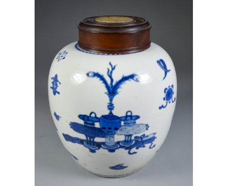 A Chinese Blue and White Porcelain Jar, Kangxi Period, painted with vases of flowers, censers, scrolls and other motifs, 9ins