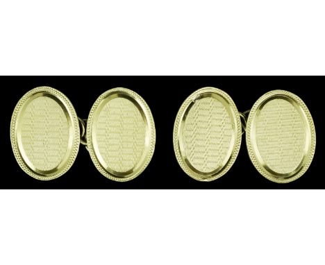 A Pair of Gentleman's 18ct Gold Cufflinks, the oval faces with engine turned ornament, weight 11g, six plain 18ct gold studs,