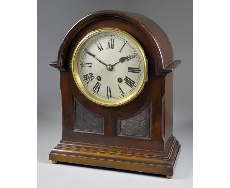 An Early 20th Century German Mahogany Cased Mantel Clock, the 5ins diameter silvered dial with Roman numerals, to the eight d