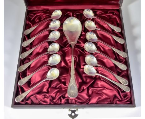 A set of Twelve Continental Silvery Metal Coffee Spoons and Matching Larger Spoon, the handles engraved with shield shaped ca