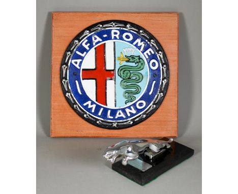 A Jaguar Car Mascot, with chromium plated finish, mounted on black base with engraved plaque "Grace, Space and Pace", 3.25ins