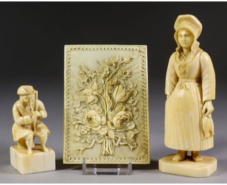 A French Carved Ivory Standing Figure, (possibly Dieppe, Second Half of the 19th Century), of a fisherwoman carrying two fish