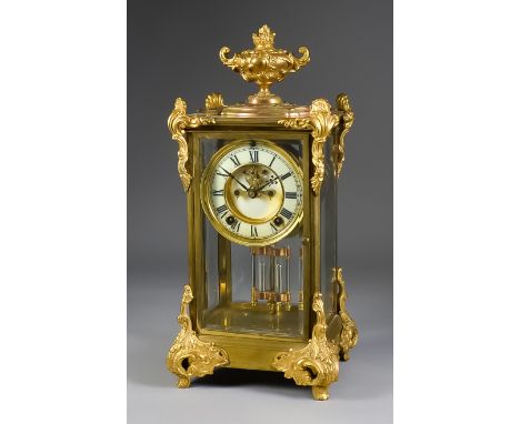 A Late 19th Century American Gilt Brass Cased "Four Glass" Mantel Clock, by The Ansonia Clock Co., the 3.5ins diameter cream 