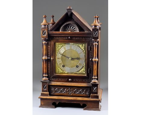 A Late 19th Century German Walnut Cased Mantel Clock, by Winterhalder &amp; Hofmeier, the brass dial with 4.5ins diameter sil
