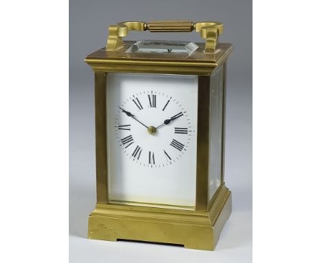 A Late 19th/Early 20th Century French Carriage Clock, the white enamelled dial with Roman numerals, to the eight day two trai