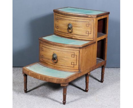 A Late George III Mahogany Bowfront Three-Tier Bedstep Commode, with dummy drawer fronts, the top surfaces inset with green b