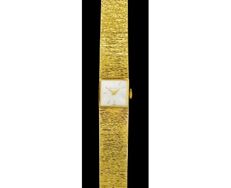 A Lady's Jean Renet Cocktail Watch, 1960's, 9ct gold cased, the silver dial with gilt numeral batons, 14mm square, on integra