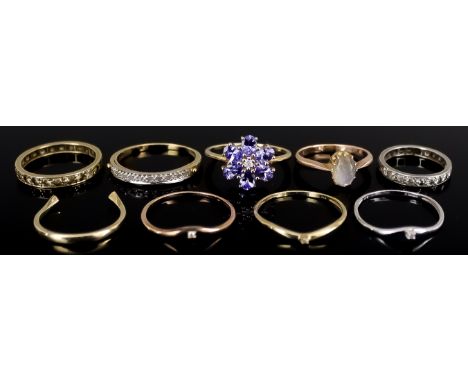 Eight 9ct Gold Gem Set Rings Various, Modern, comprising - two eternity rings, sizes S+ and K, a triple band ring, size R, th