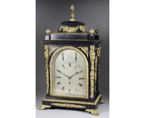 A Good Late Victorian Gilt Brass Mounted Ebonised Mantel Clock of 18th Century Design, the arched silver dial with Roman nume