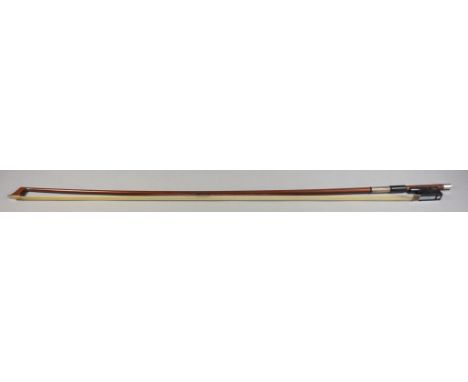 A Swiss Finkel Atelier Violin Bow, with round stick, ebony frog with mother-of-pearl inlay and silver metal adjuster, stamped