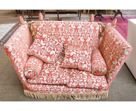 A small Knoll style drop end sofa in red and floral brocade upholstery, 142cmCondition report: No major movement in the frame