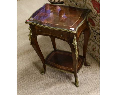 A Pair of 20th Century French Style Gilt Metal Mounted Bedside Tables, each of serpentine shaped form above a single drawer, 