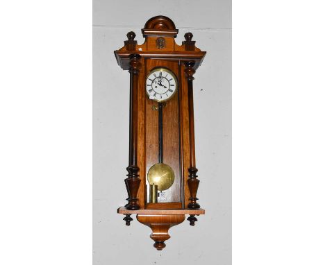 A Vienna twin-weight clock Condition report: Case faded in parts, surface scratches, pediment with some molding missing, door