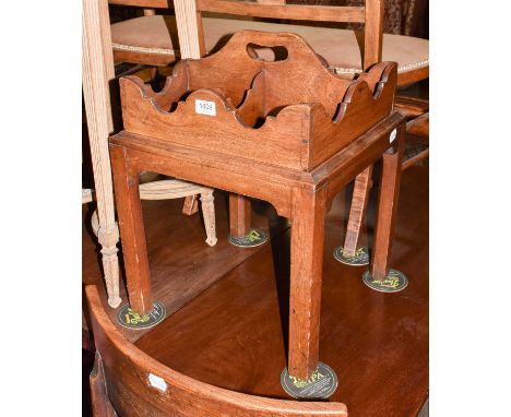A George III mahogany four-division housekeeper's caddy on stand, 40cm square by 44cm