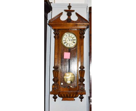 A walnut veneered Vienna type wall clock with twin train movement, signed Gustav Becker, 115cm high (later case)