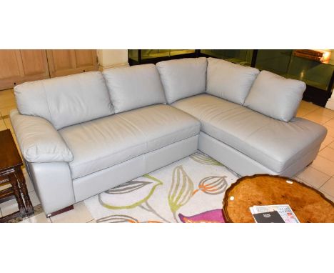 A modern grey leather upholstered corner sofa, 250cm by 180cm by 90cm, together with a matching armchair (2)