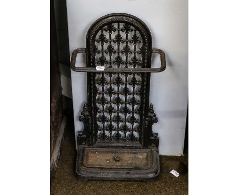 A small Victorian cast iron stick stand, the arched back plate with reeded support rail, 36cm by 17cm by 74cmCondition report