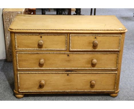 An early 19th century three-height pine chest of drawers, 113cm by 55cm by 76cmCondition report: Top and sides with splits, d