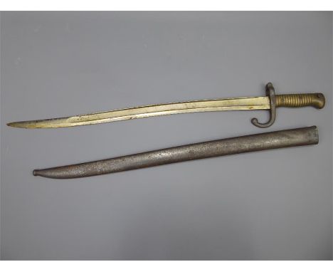 An English 'Yatagan' Curved Bayonet, for an Snider Enfield Musket Rifle, complete with scabbard. Provenance: The owner of thi